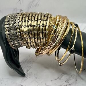 10 assorted style gold tone bracelets